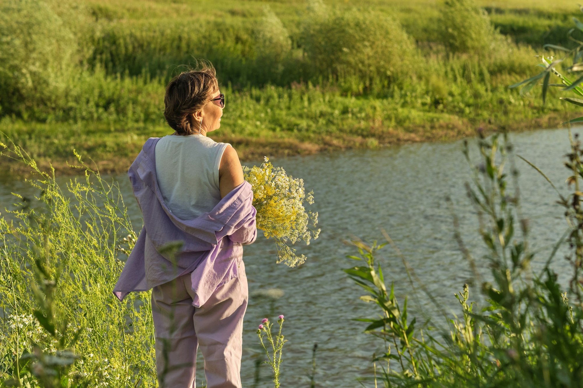 Picture of a relaxed elderly woman, demonstrating the peace of mind that proper financial